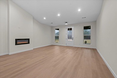 You can't miss this eye-catching new build right off Highway 357 on Woodfin Ridge Golf Club in South Carolina - for sale on GolfHomes.com, golf home, golf lot