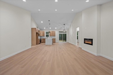 You can't miss this eye-catching new build right off Highway 357 on Woodfin Ridge Golf Club in South Carolina - for sale on GolfHomes.com, golf home, golf lot