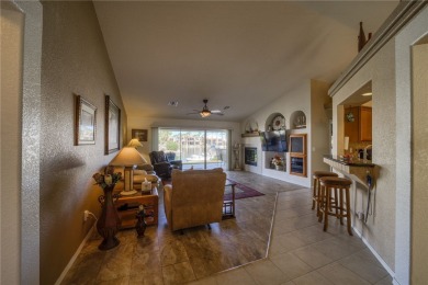 Welcome to your waterfront retreat in the highly sought-after on Los Lagos Golf Club in Arizona - for sale on GolfHomes.com, golf home, golf lot