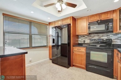FULLY UPDATED UNIT BOASTING FULL IMPACT WINDOWS, DOORS & PATIO! on Wynmoor Golf Course in Florida - for sale on GolfHomes.com, golf home, golf lot