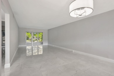FULLY RENOVATED 2-Bedroom Condo in the Heart of Wynmoor! This on Wynmoor Golf Course in Florida - for sale on GolfHomes.com, golf home, golf lot