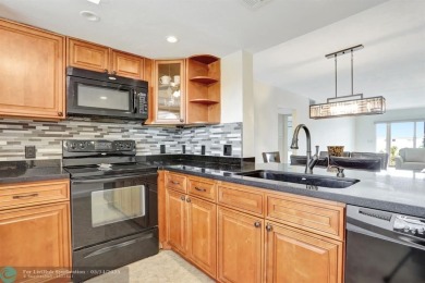 FULLY UPDATED UNIT BOASTING FULL IMPACT WINDOWS, DOORS & PATIO! on Wynmoor Golf Course in Florida - for sale on GolfHomes.com, golf home, golf lot