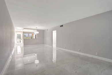 FULLY RENOVATED 2-Bedroom Condo in the Heart of Wynmoor! This on Wynmoor Golf Course in Florida - for sale on GolfHomes.com, golf home, golf lot