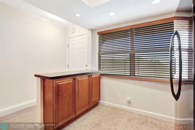 FULLY UPDATED UNIT BOASTING FULL IMPACT WINDOWS, DOORS & PATIO! on Wynmoor Golf Course in Florida - for sale on GolfHomes.com, golf home, golf lot