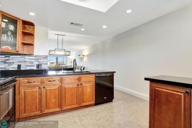 FULLY UPDATED UNIT BOASTING FULL IMPACT WINDOWS, DOORS & PATIO! on Wynmoor Golf Course in Florida - for sale on GolfHomes.com, golf home, golf lot