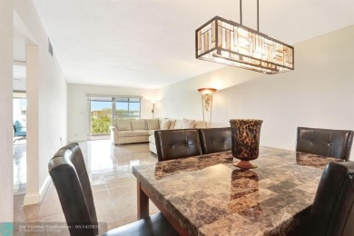 FULLY UPDATED UNIT BOASTING FULL IMPACT WINDOWS, DOORS & PATIO! on Wynmoor Golf Course in Florida - for sale on GolfHomes.com, golf home, golf lot