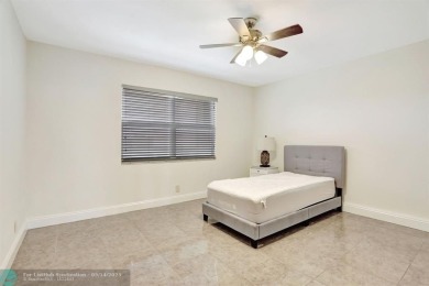 FULLY UPDATED UNIT BOASTING FULL IMPACT WINDOWS, DOORS & PATIO! on Wynmoor Golf Course in Florida - for sale on GolfHomes.com, golf home, golf lot