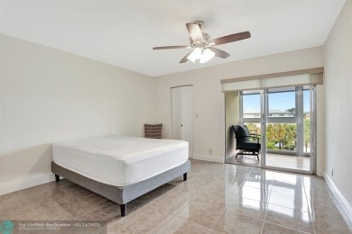 FULLY UPDATED UNIT BOASTING FULL IMPACT WINDOWS, DOORS & PATIO! on Wynmoor Golf Course in Florida - for sale on GolfHomes.com, golf home, golf lot