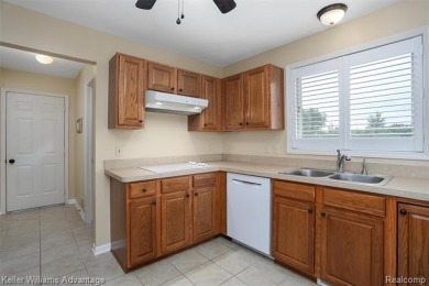 Beautifully maintained end-unit condo located on a cul-de-sac in on Beacon Hill Golf Club in Michigan - for sale on GolfHomes.com, golf home, golf lot