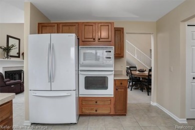 Beautifully maintained end-unit condo located on a cul-de-sac in on Beacon Hill Golf Club in Michigan - for sale on GolfHomes.com, golf home, golf lot