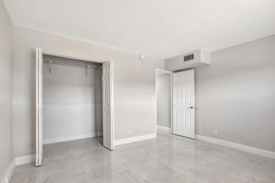 FULLY RENOVATED 2-Bedroom Condo in the Heart of Wynmoor! This on Wynmoor Golf Course in Florida - for sale on GolfHomes.com, golf home, golf lot