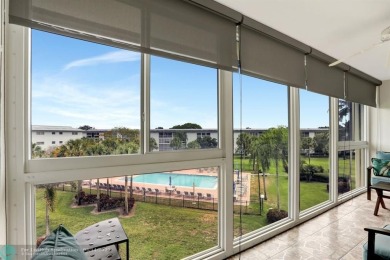 FULLY UPDATED UNIT BOASTING FULL IMPACT WINDOWS, DOORS & PATIO! on Wynmoor Golf Course in Florida - for sale on GolfHomes.com, golf home, golf lot