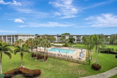 FULLY UPDATED UNIT BOASTING FULL IMPACT WINDOWS, DOORS & PATIO! on Wynmoor Golf Course in Florida - for sale on GolfHomes.com, golf home, golf lot