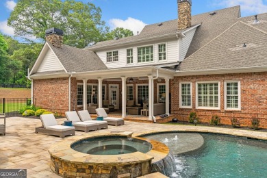 This stunning executive home sits on 2 acres in the Creekview on Woodmont Golf and Country Club in Georgia - for sale on GolfHomes.com, golf home, golf lot