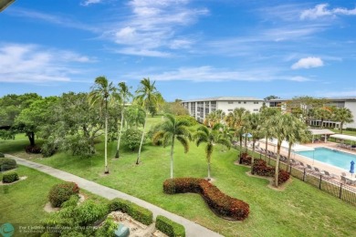 FULLY UPDATED UNIT BOASTING FULL IMPACT WINDOWS, DOORS & PATIO! on Wynmoor Golf Course in Florida - for sale on GolfHomes.com, golf home, golf lot