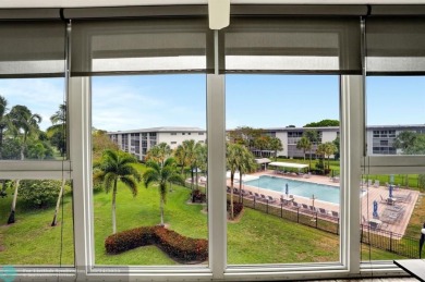 FULLY UPDATED UNIT BOASTING FULL IMPACT WINDOWS, DOORS & PATIO! on Wynmoor Golf Course in Florida - for sale on GolfHomes.com, golf home, golf lot