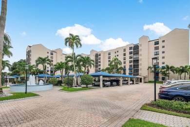 Discover this stunning condo with breathtaking lake and golf on Boca Pointe Country Club in Florida - for sale on GolfHomes.com, golf home, golf lot