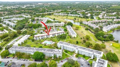 FULLY UPDATED UNIT BOASTING FULL IMPACT WINDOWS, DOORS & PATIO! on Wynmoor Golf Course in Florida - for sale on GolfHomes.com, golf home, golf lot