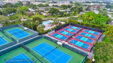 FULLY UPDATED UNIT BOASTING FULL IMPACT WINDOWS, DOORS & PATIO! on Wynmoor Golf Course in Florida - for sale on GolfHomes.com, golf home, golf lot