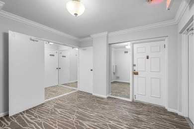 Discover this stunning condo with breathtaking lake and golf on Boca Pointe Country Club in Florida - for sale on GolfHomes.com, golf home, golf lot
