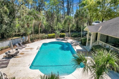 Nestled within the gates of Hampton Plantation, this beautifully on The King and Prince Golf Course, Home of the Hampton Club in Georgia - for sale on GolfHomes.com, golf home, golf lot