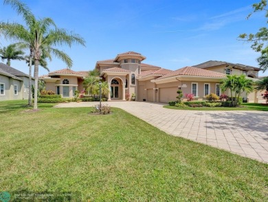 Price Improvement! MAGNIFICENT CUSTOM POOL HOME ON LARGE WATER on Heron Bay Golf Club in Florida - for sale on GolfHomes.com, golf home, golf lot