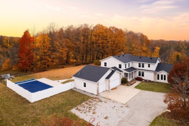 Welcome home to this stunner at Gaylord Golf Club in the heart on Gaylord Country Club in Michigan - for sale on GolfHomes.com, golf home, golf lot