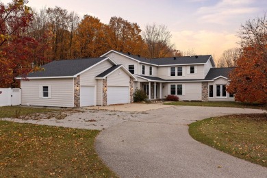 Welcome home to this stunner at Gaylord Golf Club in the heart on Gaylord Country Club in Michigan - for sale on GolfHomes.com, golf home, golf lot