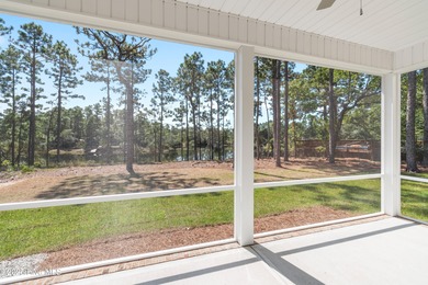 This exceptional new lakefront home by Langbeen Builders, Inc on The Lakes Country Club in North Carolina - for sale on GolfHomes.com, golf home, golf lot
