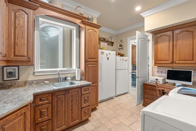 This distinguished custom-built residence is situated within the on Sandestin Golf and Beach Resort - Raven in Florida - for sale on GolfHomes.com, golf home, golf lot