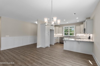 This exceptional new lakefront home by Langbeen Builders, Inc on The Lakes Country Club in North Carolina - for sale on GolfHomes.com, golf home, golf lot