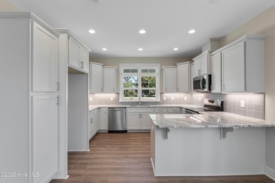 This exceptional new lakefront home by Langbeen Builders, Inc on The Lakes Country Club in North Carolina - for sale on GolfHomes.com, golf home, golf lot