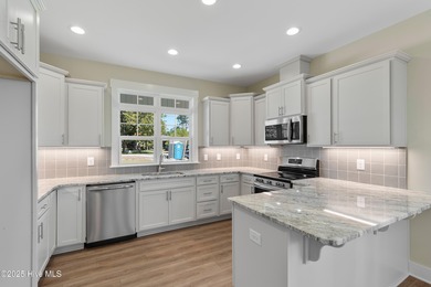 This exceptional new lakefront home by Langbeen Builders, Inc on The Lakes Country Club in North Carolina - for sale on GolfHomes.com, golf home, golf lot