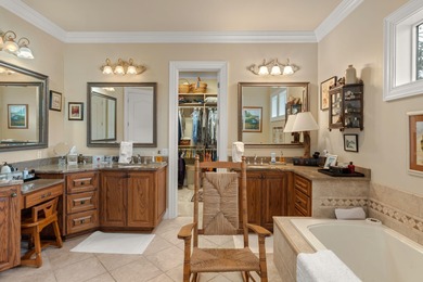 This distinguished custom-built residence is situated within the on Sandestin Golf and Beach Resort - Raven in Florida - for sale on GolfHomes.com, golf home, golf lot