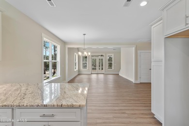 This exceptional new lakefront home by Langbeen Builders, Inc on The Lakes Country Club in North Carolina - for sale on GolfHomes.com, golf home, golf lot