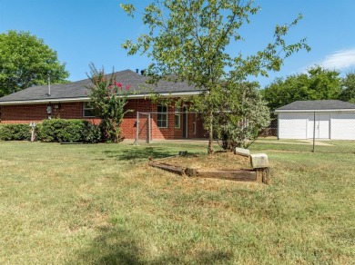This beautifully maintained brick home is in a quite tree-shaded on White Bluff Resort - New Course in Texas - for sale on GolfHomes.com, golf home, golf lot