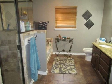You don't want to miss the opportunity to look at an affordable on De Cordova Bend Country Club in Texas - for sale on GolfHomes.com, golf home, golf lot