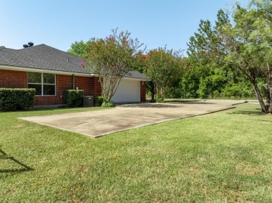 This beautifully maintained brick home is in a quite tree-shaded on White Bluff Resort - New Course in Texas - for sale on GolfHomes.com, golf home, golf lot