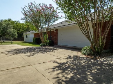 This beautifully maintained brick home is in a quite tree-shaded on White Bluff Resort - New Course in Texas - for sale on GolfHomes.com, golf home, golf lot