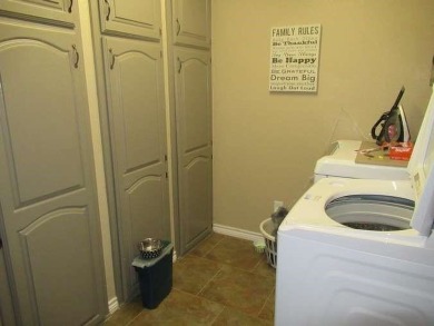 You don't want to miss the opportunity to look at an affordable on De Cordova Bend Country Club in Texas - for sale on GolfHomes.com, golf home, golf lot