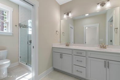 This exceptional new lakefront home by Langbeen Builders, Inc on The Lakes Country Club in North Carolina - for sale on GolfHomes.com, golf home, golf lot