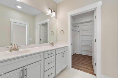 This exceptional new lakefront home by Langbeen Builders, Inc on The Lakes Country Club in North Carolina - for sale on GolfHomes.com, golf home, golf lot