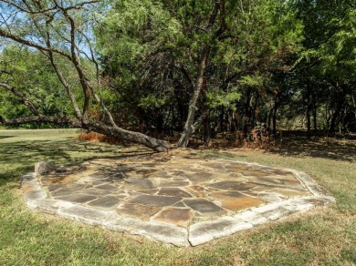 This beautifully maintained brick home is in a quite tree-shaded on White Bluff Resort - New Course in Texas - for sale on GolfHomes.com, golf home, golf lot