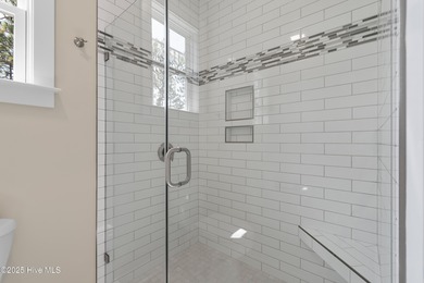 This exceptional new lakefront home by Langbeen Builders, Inc on The Lakes Country Club in North Carolina - for sale on GolfHomes.com, golf home, golf lot