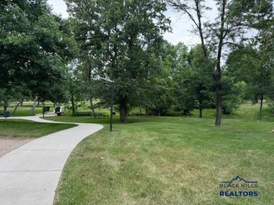 Beautiful 3rd-Floor Condo with Elevator  Heated Parking! Step on Arrowhead Country Club in South Dakota - for sale on GolfHomes.com, golf home, golf lot