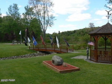 Nice Level Lot located in the Hideout Community. Year Round on The Hideout Golf in Pennsylvania - for sale on GolfHomes.com, golf home, golf lot
