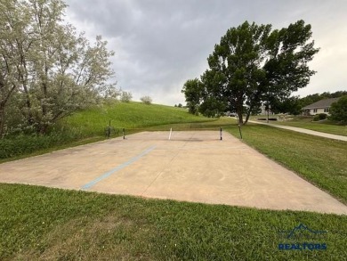 Beautiful 3rd-Floor Condo with Elevator  Heated Parking! Step on Arrowhead Country Club in South Dakota - for sale on GolfHomes.com, golf home, golf lot
