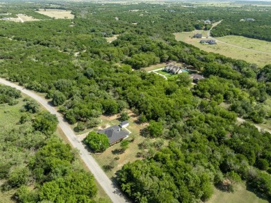 This beautifully maintained brick home is in a quite tree-shaded on White Bluff Resort - New Course in Texas - for sale on GolfHomes.com, golf home, golf lot