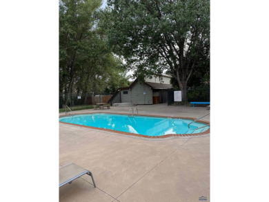 Beautiful 3rd-Floor Condo with Elevator  Heated Parking! Step on Arrowhead Country Club in South Dakota - for sale on GolfHomes.com, golf home, golf lot