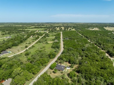 This beautifully maintained brick home is in a quite tree-shaded on White Bluff Resort - New Course in Texas - for sale on GolfHomes.com, golf home, golf lot